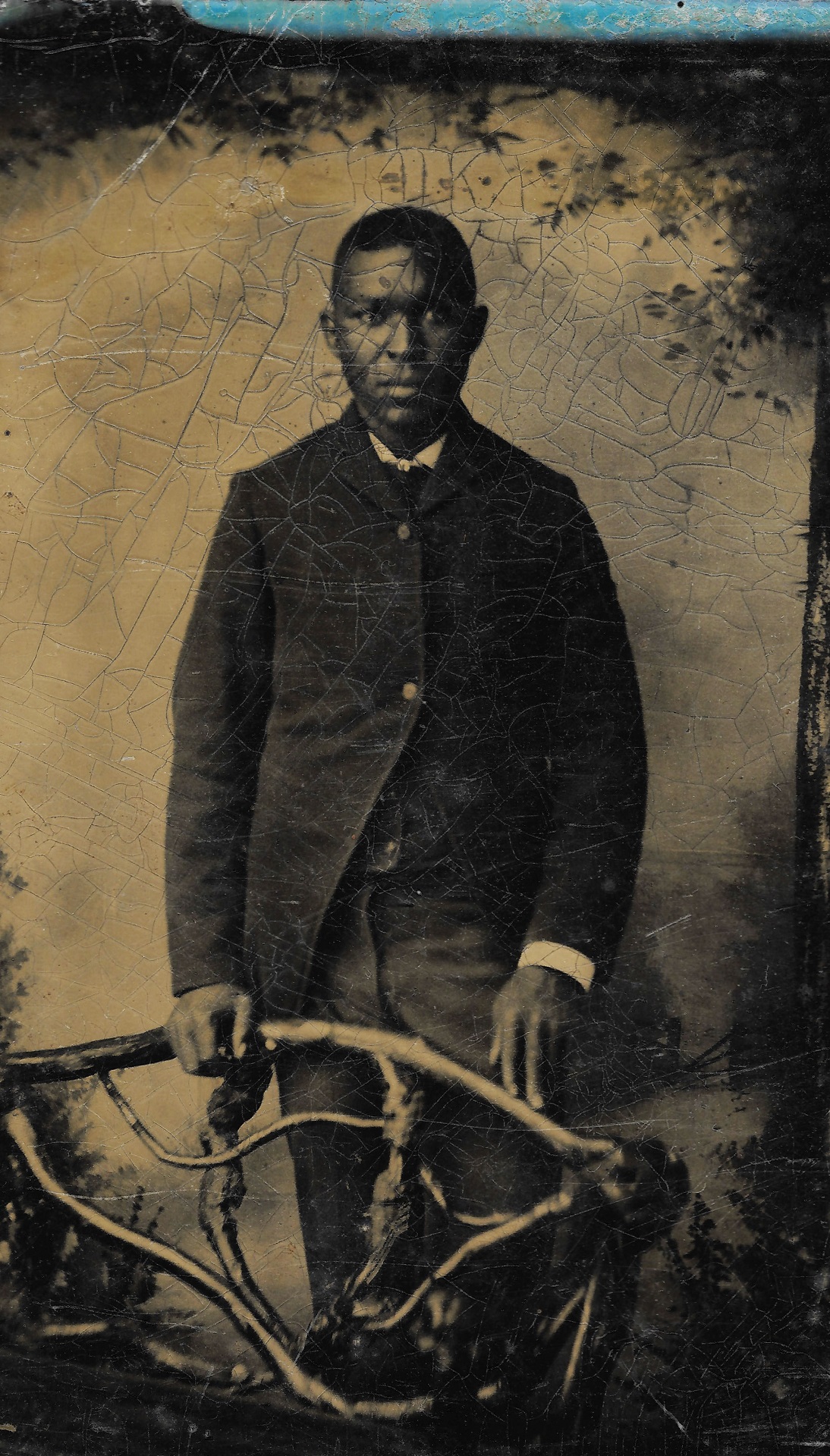 Portrait of African American Man in front of a bench Lehi Utah Tintype Scan